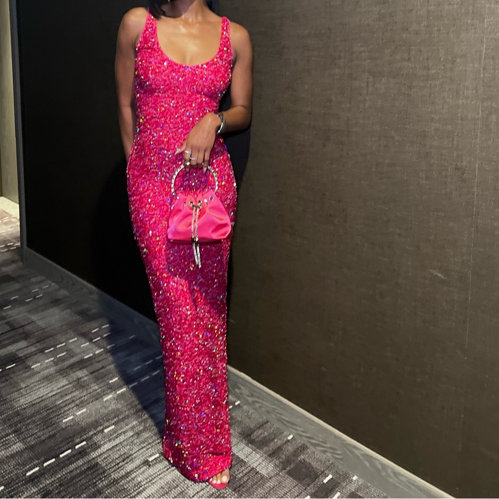 Hot pink, show-stopping sequins dress.